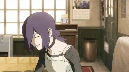 Girl With Purple Hair Sitting at Table