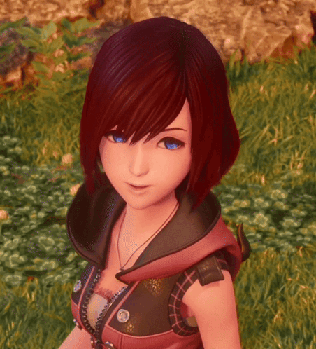 Girl With Red Hair And Blue Eyes Standing In Grass GIF