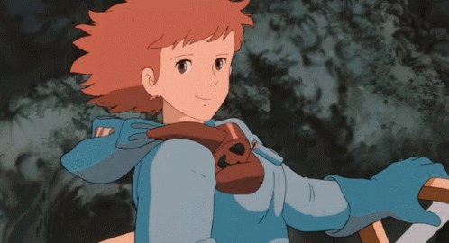 Girl With Red Hair And Blue Jacket Smiling GIF