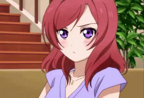 Girl with Red Hair and Purple Eyes
