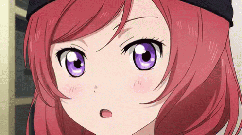 Girl with Red Hair and Purple Eyes