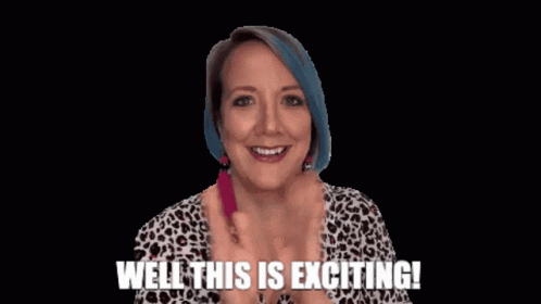 Girl With Red Hair Holding Cell Phone GIF