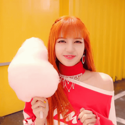 Girl With Red Hair Holding Cotton Candy