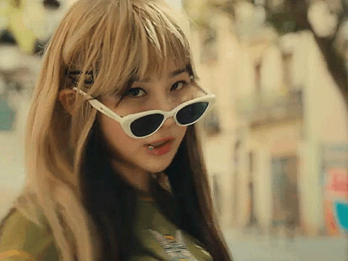 Girl With Sunglasses and Lip Piercing