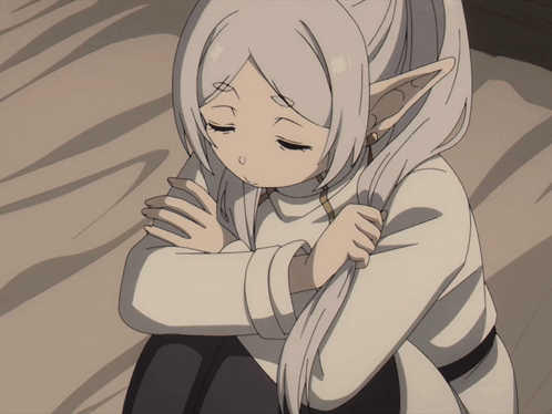 Girl with White Hair and Elf Ears Hugging Knees