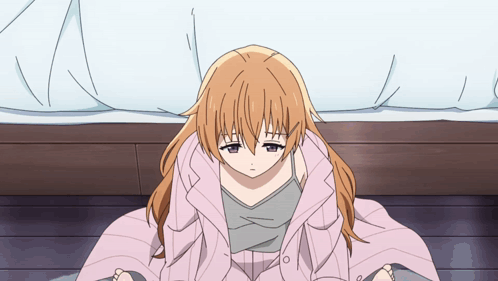 Girl Wrapped in Pink Blanket Sitting on Floor