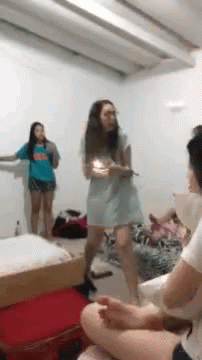 Girls Fighting And Throws Some Object GIF