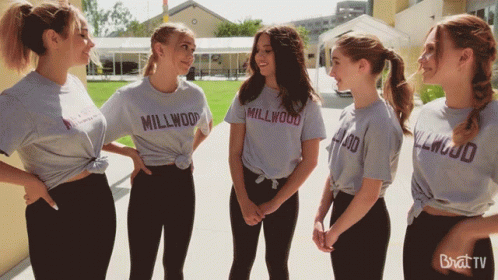 Girls In Millwood T-Shirts Standing Together GIF