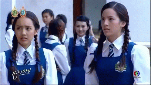 Girls in School Uniforms Standing Together