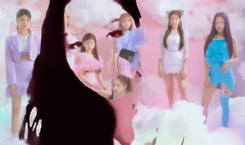 Girls Standing in Front of Pink Cloud Background