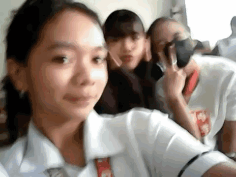 Girls Taking Selfie in Classroom