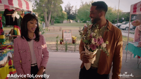 Giving Flowers To Tyra Banks GIF