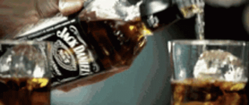 Glass With Ice And Jack Daniel's Whiskey GIF