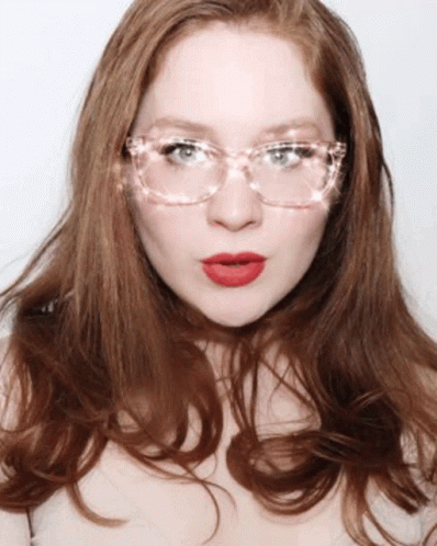 Girl Wearing Glitter Glasses GIF