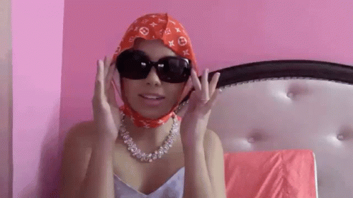 Influencer Showing Her Glasses GIF