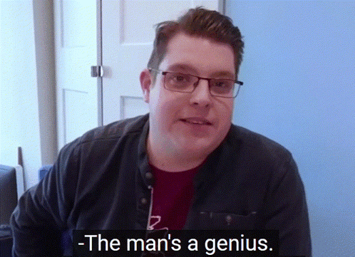 Glasses Red Shirt Man Says Man's A Genius GIF