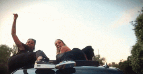 Glorilla On Car Roof GIF