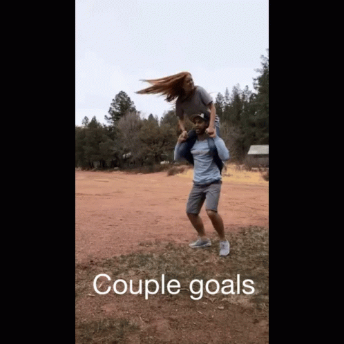 Couple Twirling Goals GIF