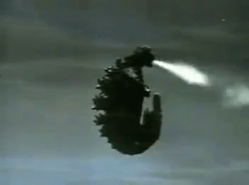 Godzilla Meme Blowing Smoke GIF
