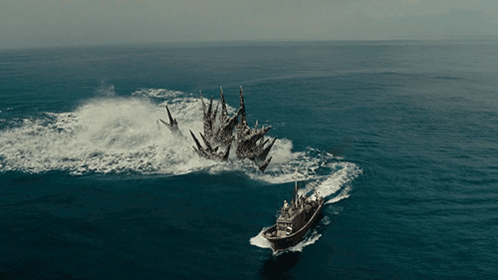 Godzilla Minus One Chasing Boat On Water GIF