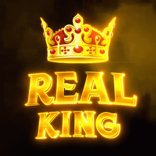 Gold Crown with Red Stones Above Real King