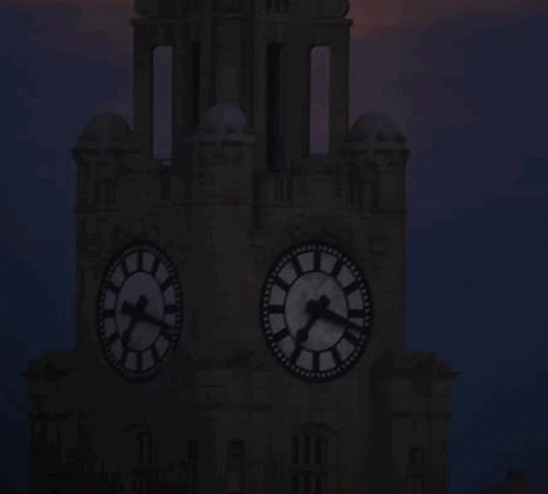 Gold Super Moon Behind Clock Tower GIF