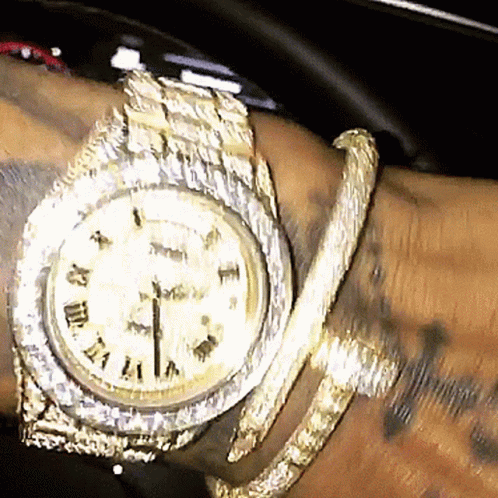 Gold Watch with Roman Numerals