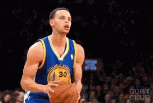 Golden State Warriors Basketball Player Stephen Curry Is Wearing Sunglasses And Holding A Basketball In His Hands . GIF