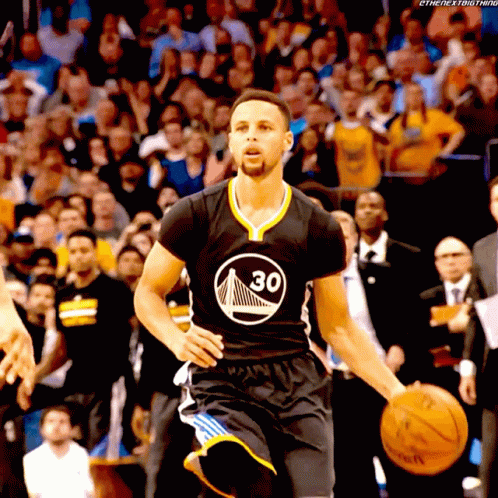 Golden State Warriors Player Dribbling Basketball