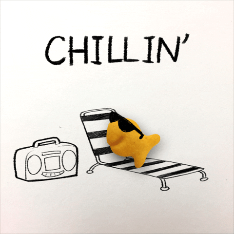 Goldfish Relaxing On A Sun Lounger GIF