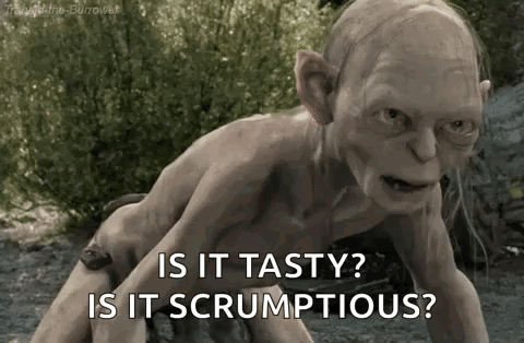 Gollum From The Lord Of The Rings Is Crawling On The Ground And Asking If It Is Tasty Or Scrumptious . GIF