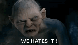 Gollum From The Lord Of The Rings Is Making A Funny Face And Says `` We Hates It ! '' GIF
