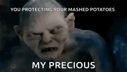 Gollum From The Lord Of The Rings Is Making A Funny Face And Says `` You Protecting Your Mashed Potatoes '' . GIF