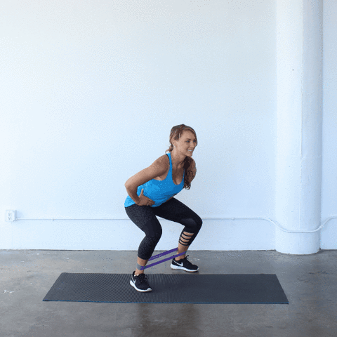 Good Fit Woman Using Exercise Bands In The Morning GIF