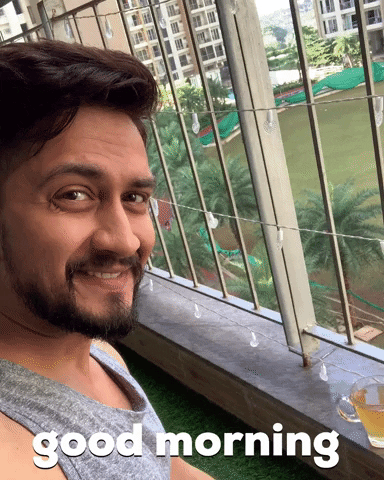 Good Morning Cute Guy Winking GIF