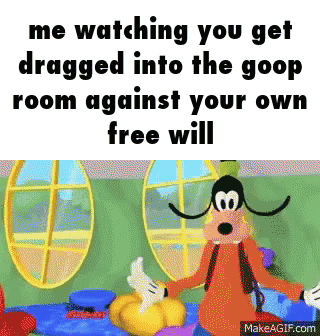 Goofy From Mickey Mouse Clubhouse Is Standing In A Room Against A Wall . GIF