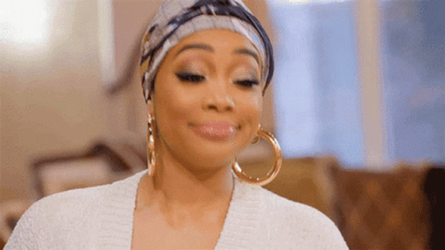 Gorgeous Lady Wearing Headscarf Nodding GIF