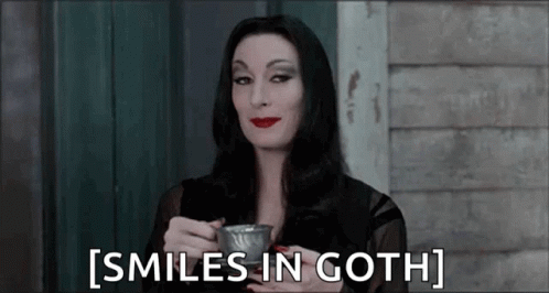 Goth Morticia Addams Sip Smiles GIF