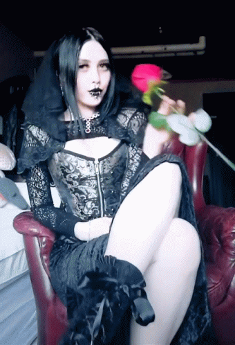 Gothic Woman Holding Rose