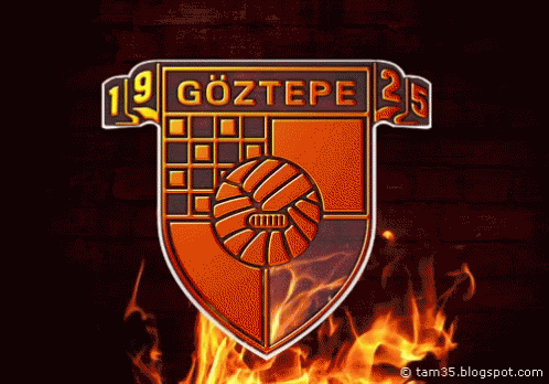 Göztepe Logo Surrounded By Flames On Dark Background GIF