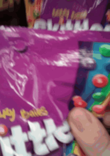 Grab A Skittles Candy Pack GIF