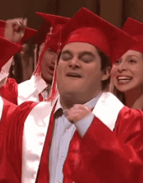 Graduates In Red Caps And Gowns Celebrating GIF