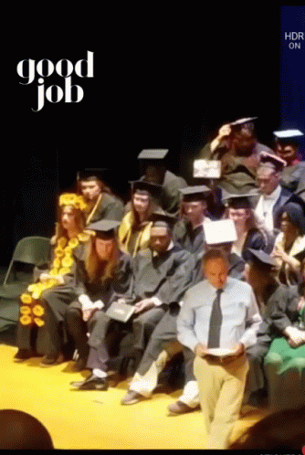 Graduates Sitting on Stage Good Job