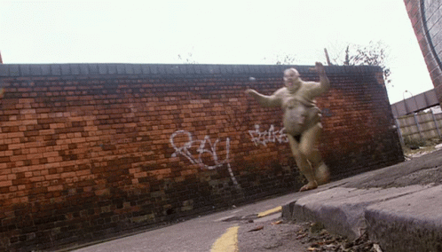 Graffiti Saying Rau on Brick Wall