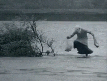 Grandma Running On The Flooded Water GIF