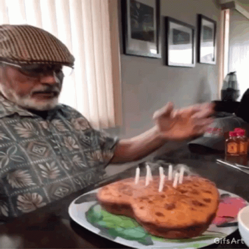 Grandpa Claps On Happy 65th Birthday Cake GIF