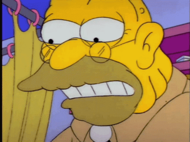 Grandpa Simpson's Dentures Falling Inside Crocodile Mouth GIF