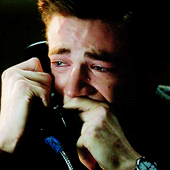 Grant Gustin Crying Phone Call GIF