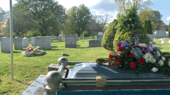 Grave With Flowers And Name Starting With A GIF