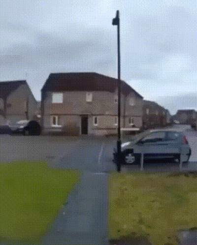 Gray Car Parked In Front Of House GIF